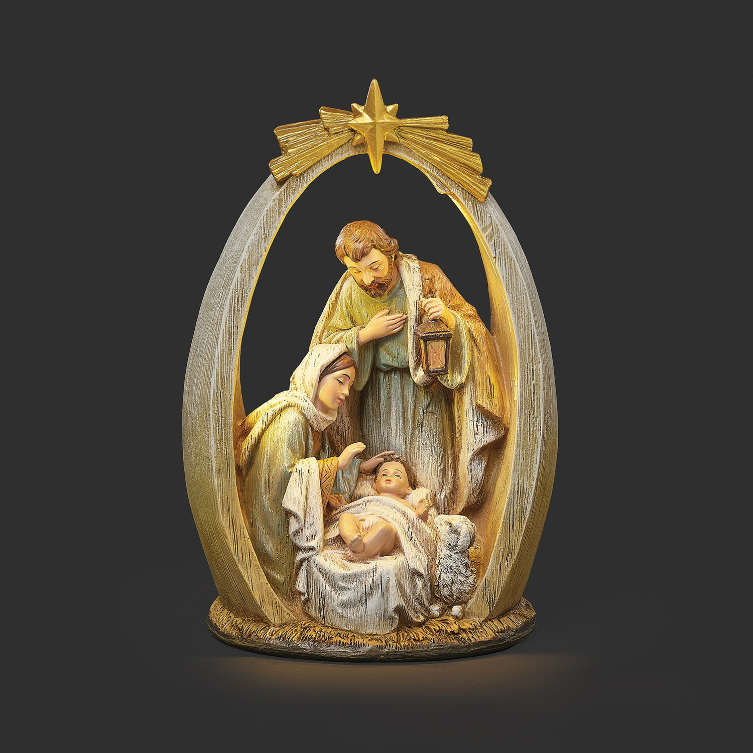 Decorative nativity scene with Mary, Joseph, and baby Jesus on a dark background