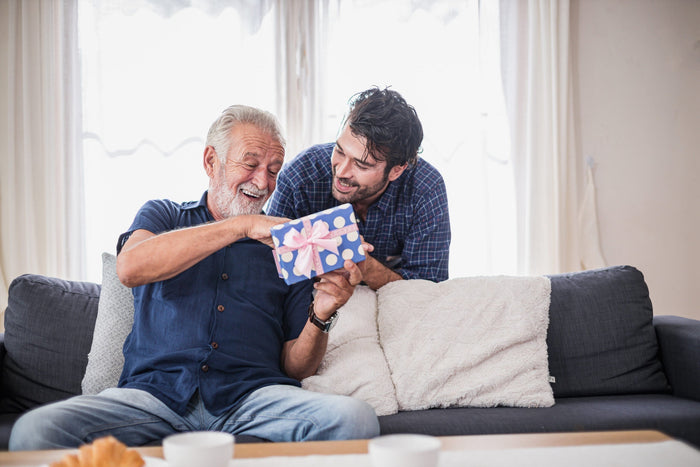 Dad receives father's day gift from his son