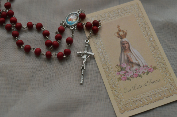 Rosary and prayer card