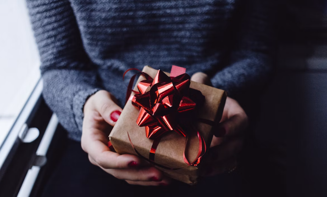 Woman giving gift